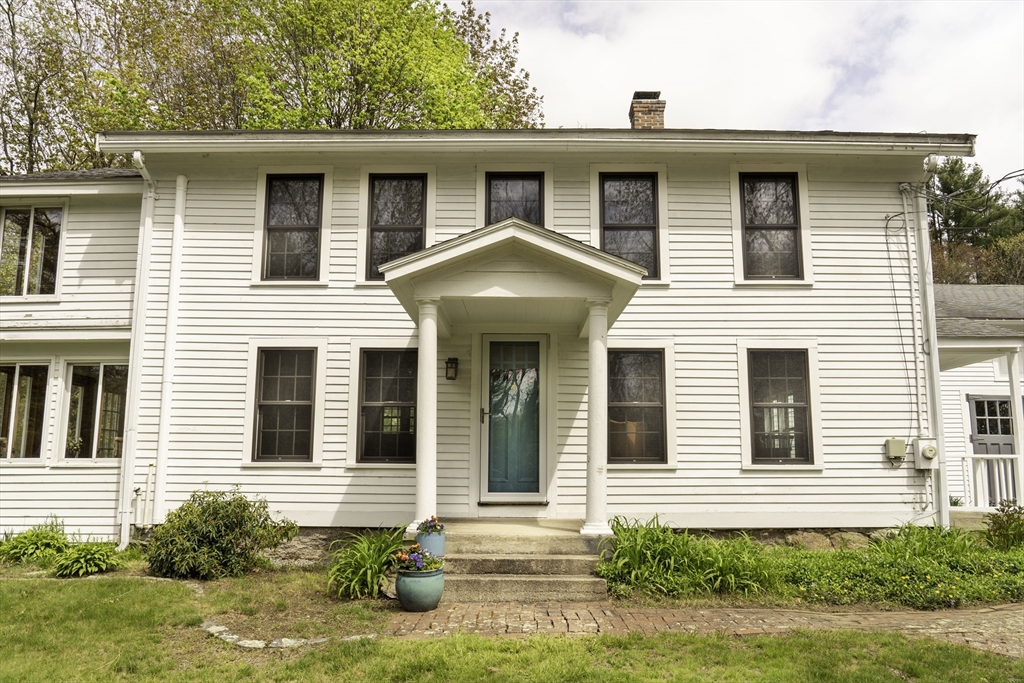 301 Cordaville Road Ashland, MA 01721 - Photo 3 of 41 a front view of a house with garden