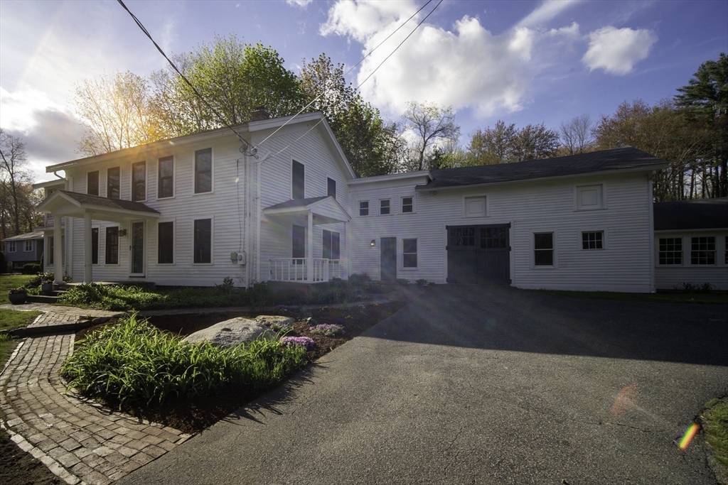 301 Cordaville Road Ashland, MA 01721 - Photo 41 of 41 a front view of a house with a garden