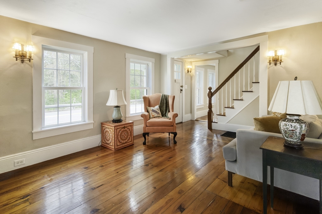 301 Cordaville Road Ashland, MA 01721 - Photo 9 of 41 a living room with furniture and a table with wooden floor