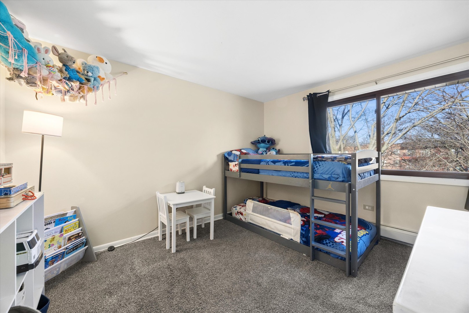 1240 South Lorraine Road, Unit 3B Wheaton, IL 60189 - Photo 11 of 17 a bedroom with a bed and a desk