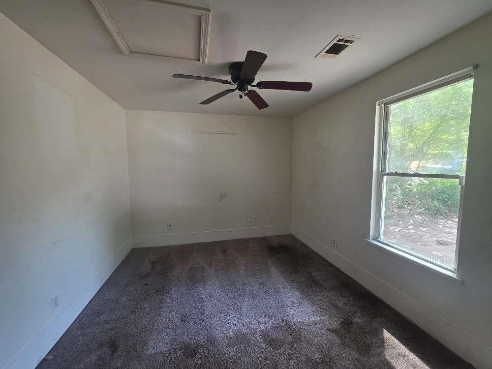 3127 Hendrix Circle Southwest Covington, GA 30014 - Photo 18 of 29 an empty room with a window