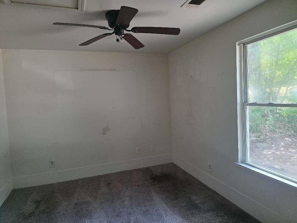 3127 Hendrix Circle Southwest Covington, GA 30014 - Photo 19 of 29 an empty room with a window