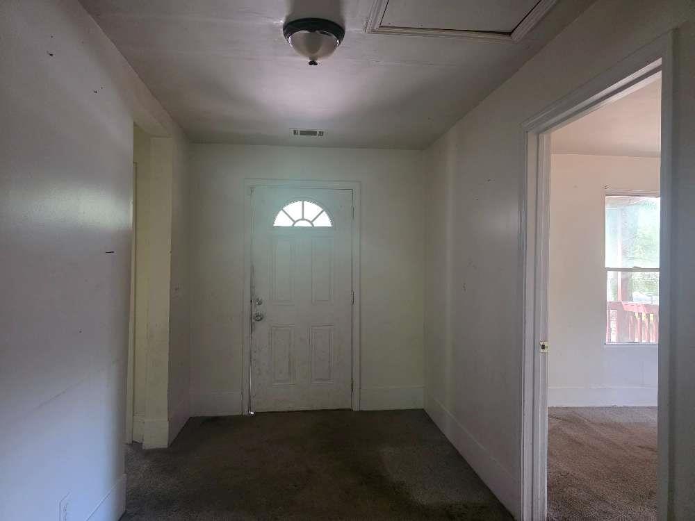 3127 Hendrix Circle Southwest Covington, GA 30014 - Photo 7 of 29 an empty room with windows