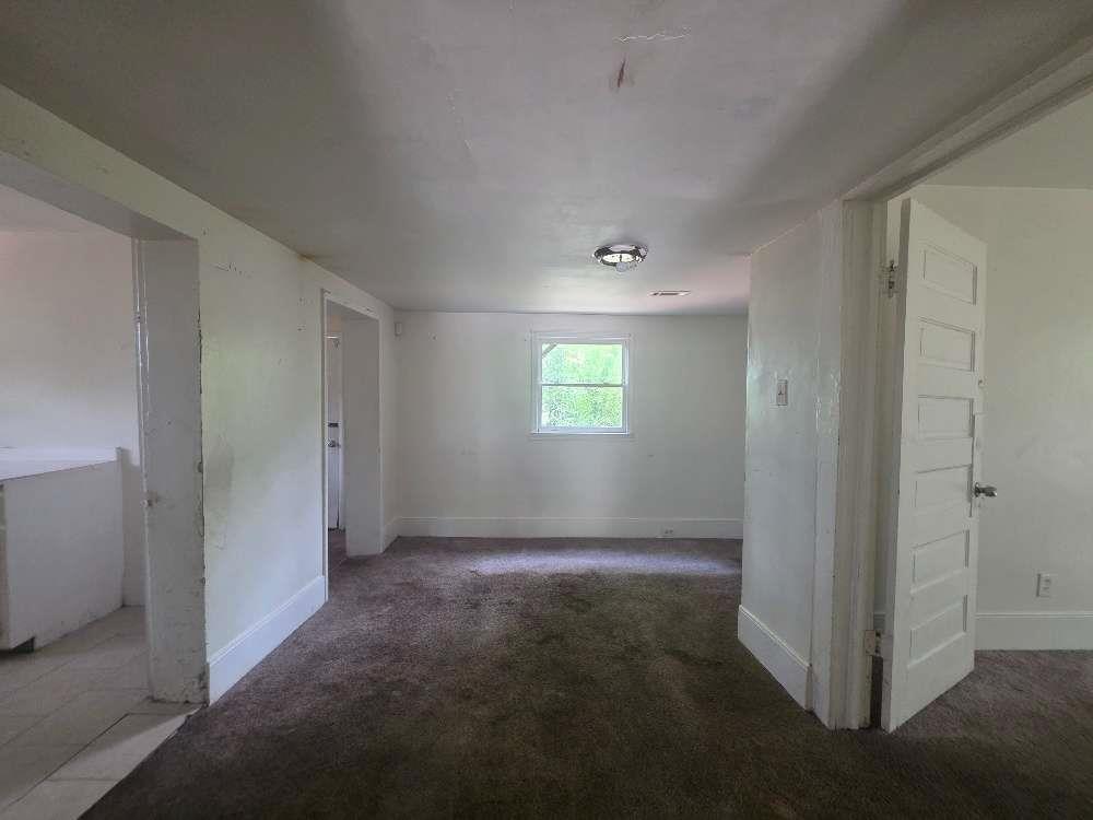 3127 Hendrix Circle Southwest Covington, GA 30014 - Photo 8 of 29 an empty room with windows