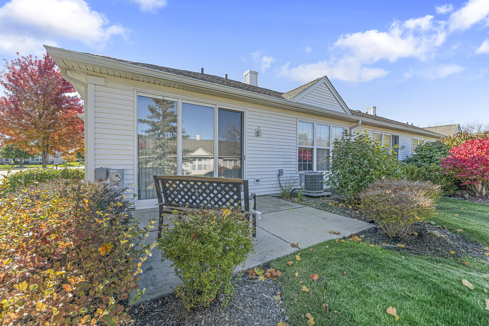 12963 Penefield Lane Huntley, IL 60142 - Photo 20 of 33 a front view of a house with garden