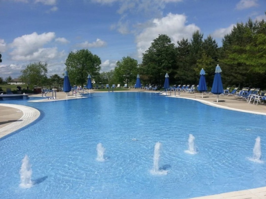 12963 Penefield Lane Huntley, IL 60142 - Photo 22 of 33 a view of a swimming pool and deck in the backyard of house
