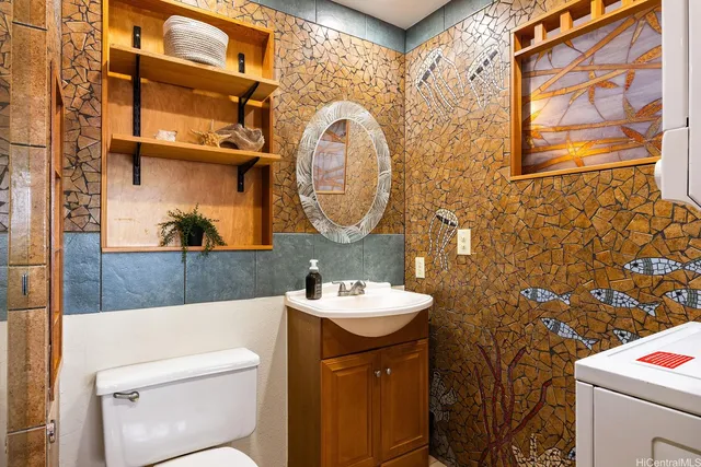 a bathroom with a shower and a sink