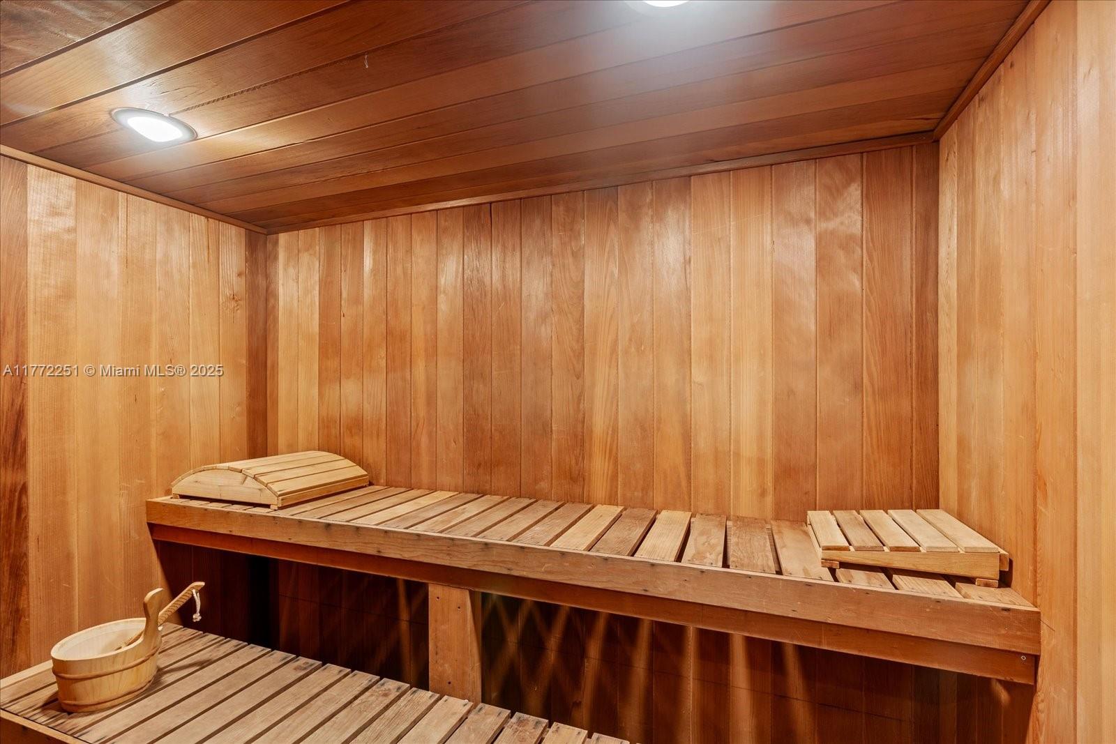 155 Ocean Ln Drive, Unit 208 Key Biscayne, FL 33149 - Photo 29 of 34 a room with a bed and curtain