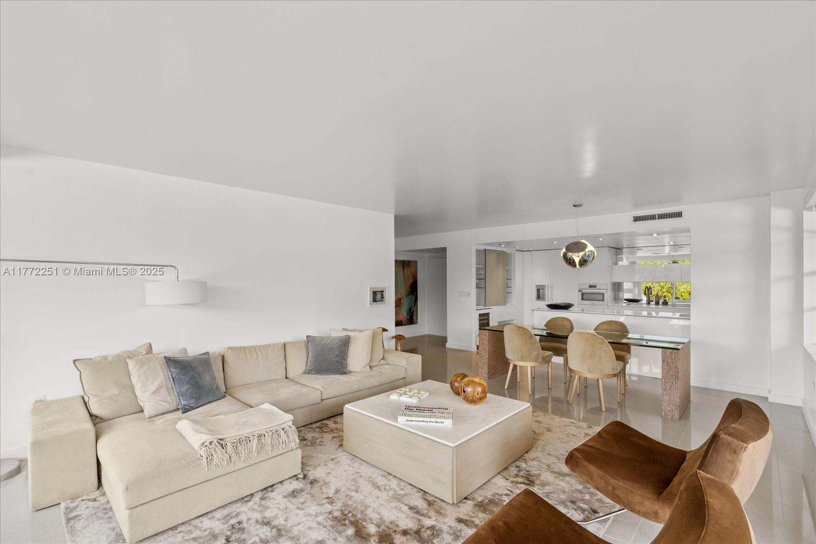 155 Ocean Ln Drive, Unit 208 Key Biscayne, FL 33149 - Photo 3 of 34 a living room with furniture and a window