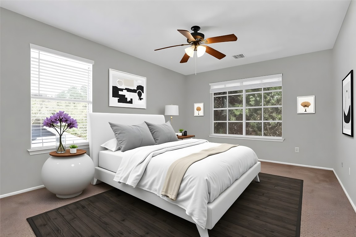 3007 Rainy River Drive Leander, TX 78641 - Photo 13 of 34 Virtually staged - Primary bedroom featuring carpet and a ceiling fan