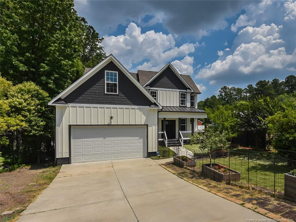 723 Lindley Drive Durham, NC 27703 - Photo 2 of 37 a front view of a house with garden
