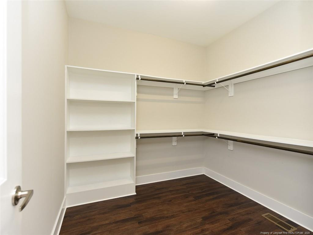 723 Lindley Drive Durham, NC 27703 - Photo 22 of 37 a view of an empty walk in closet
