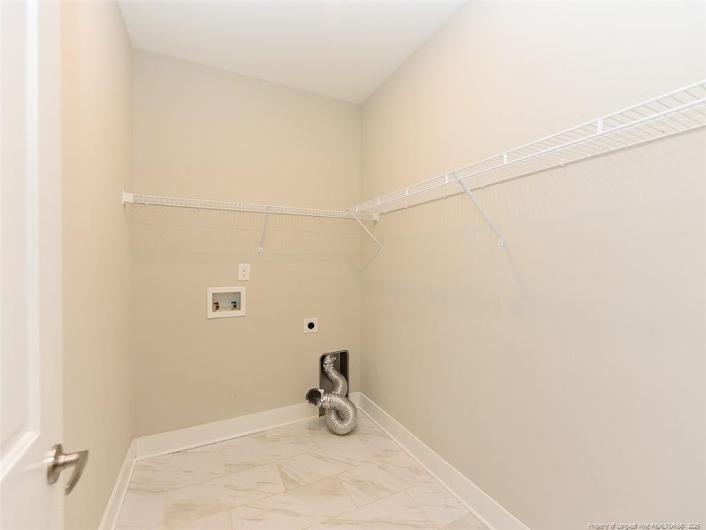 723 Lindley Drive Durham, NC 27703 - Photo 29 of 37 a bathroom with a sink and a window