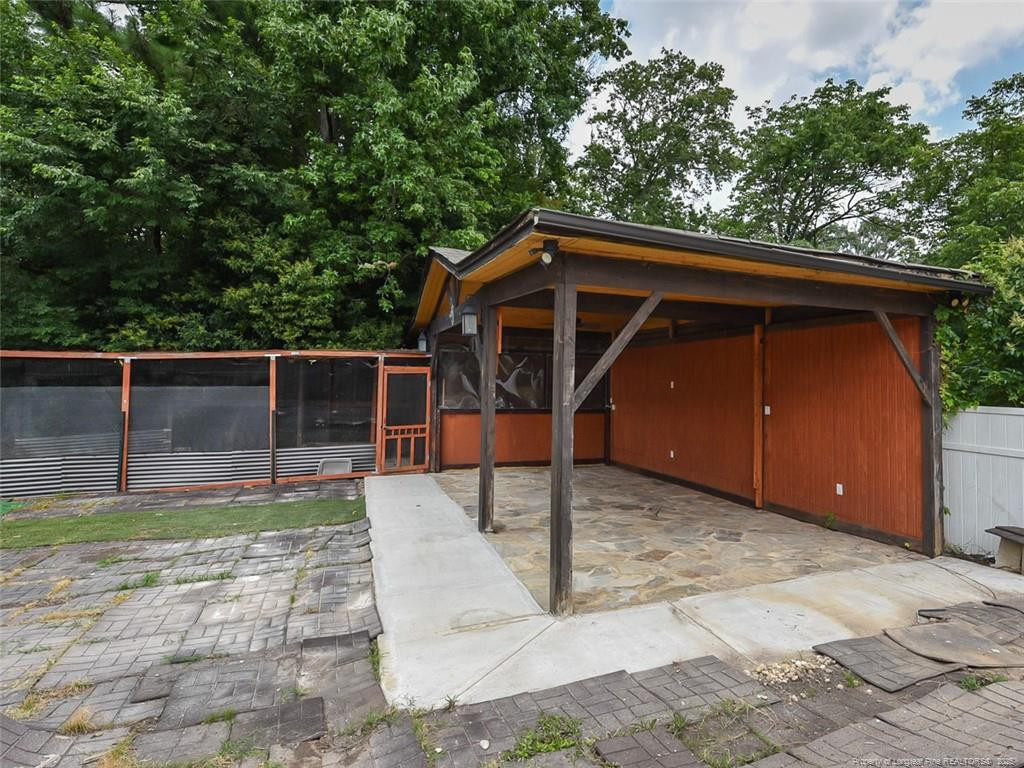 723 Lindley Drive Durham, NC 27703 - Photo 33 of 37 a view of backyard with small cabin