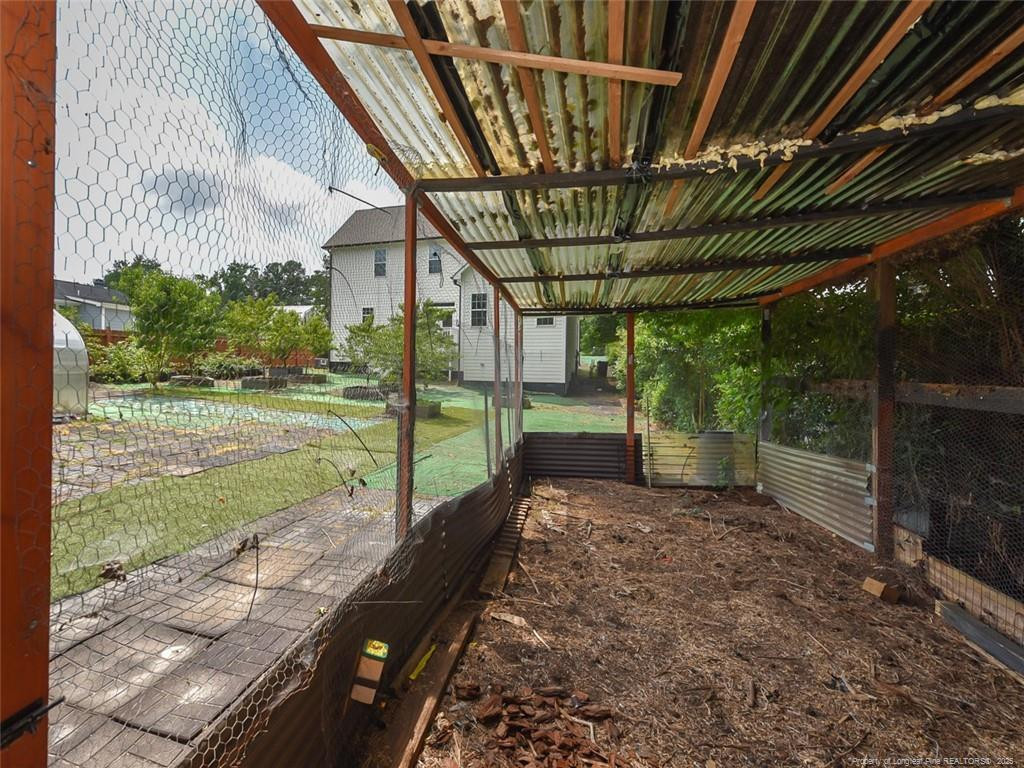 723 Lindley Drive Durham, NC 27703 - Photo 34 of 37 a view of a porch with furniture and yard