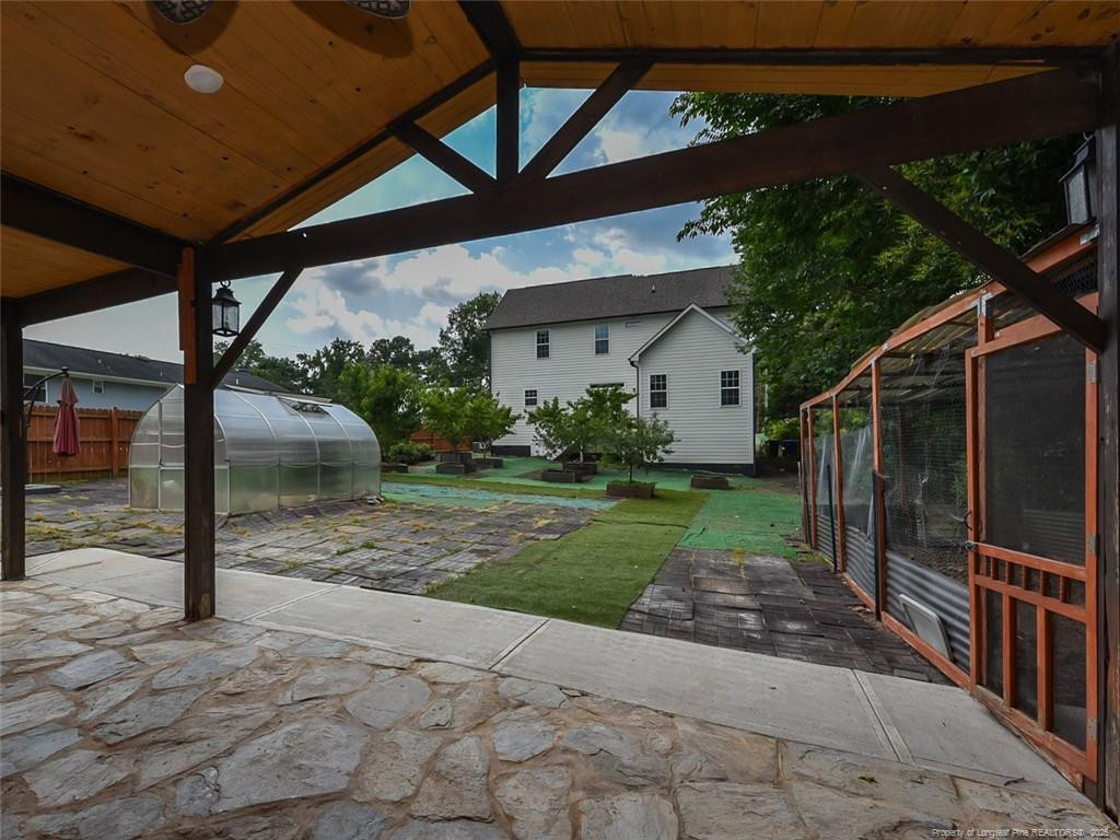 723 Lindley Drive Durham, NC 27703 - Photo 36 of 37 a view of a house with backyard and garden