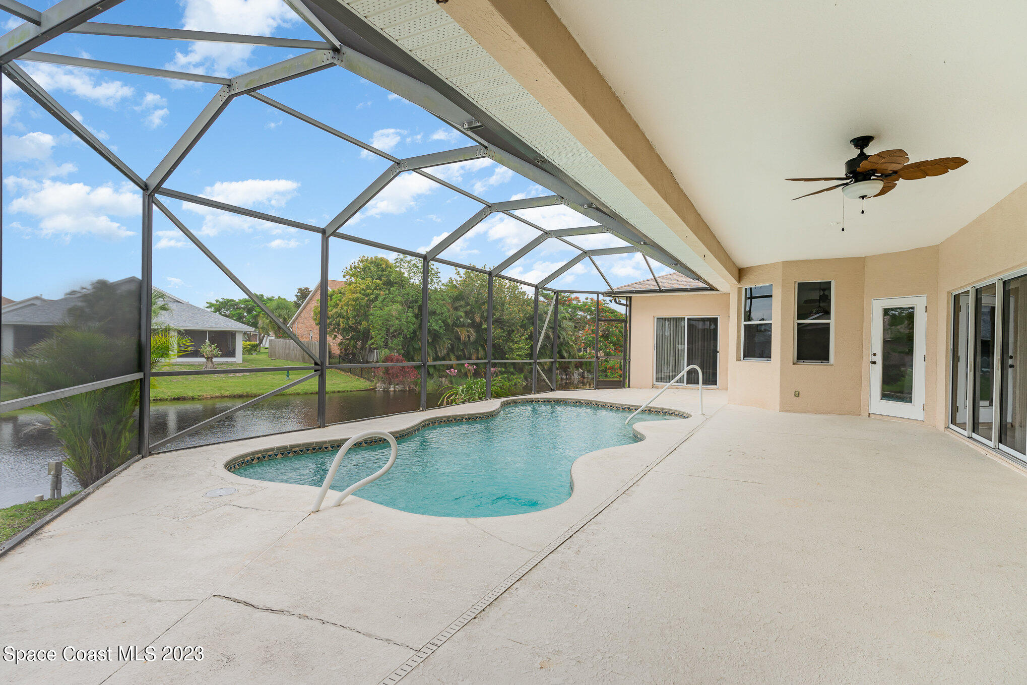 128 Palm Circle Melbourne, FL 32940 - Photo 28 of 30 a view of swimming pool with seating area
