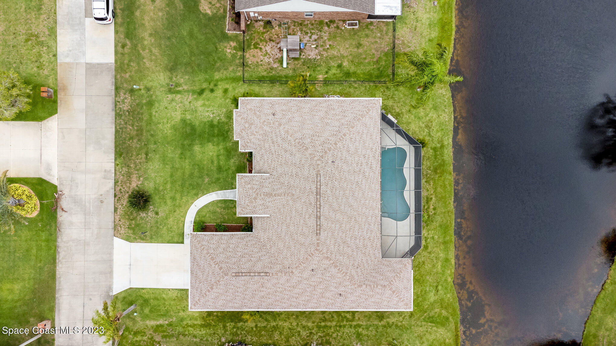 128 Palm Circle Melbourne, FL 32940 - Photo 3 of 30 view of a house with a yard