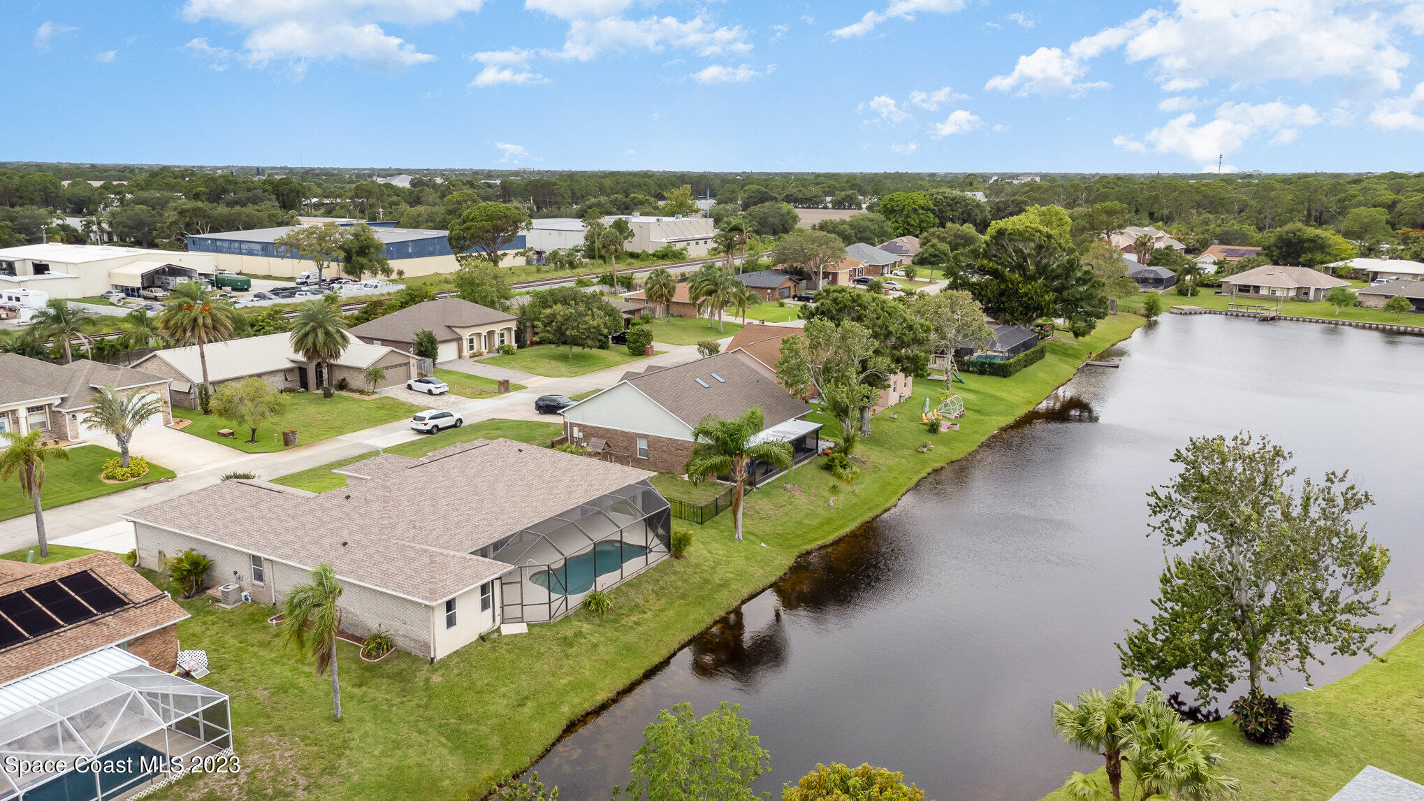 128 Palm Circle Melbourne, FL 32940 - Photo 4 of 30 an aerial view of residential houses with outdoor space