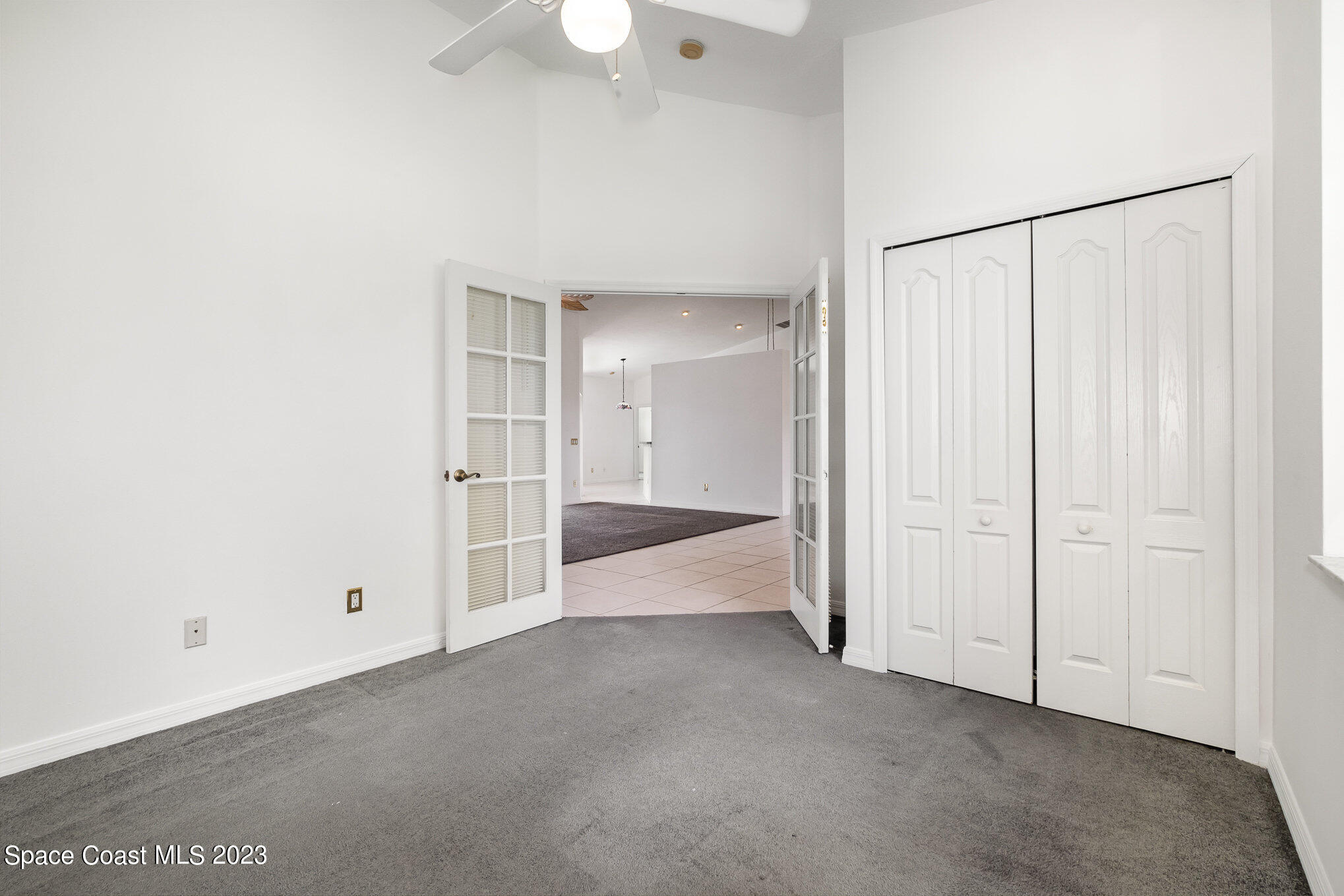 128 Palm Circle Melbourne, FL 32940 - Photo 9 of 30 an empty room with a empty space