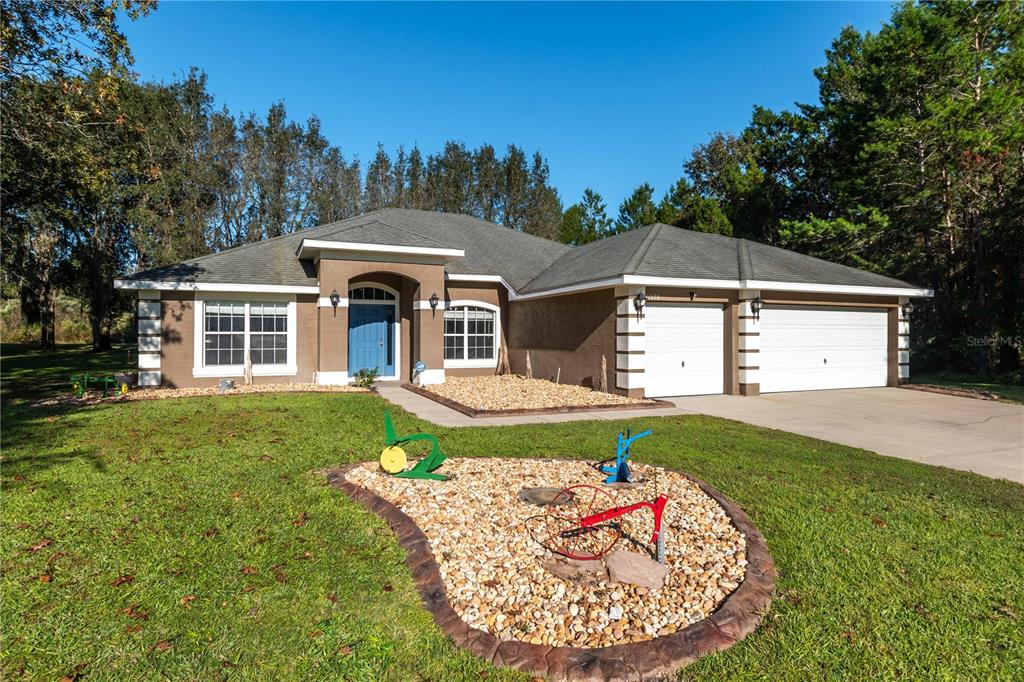 11620 Southwest 55th Avenue Ocala, FL 34476 - Photo 1 of 1 Front of home, large 1/2 acre lot on cul de sac.
