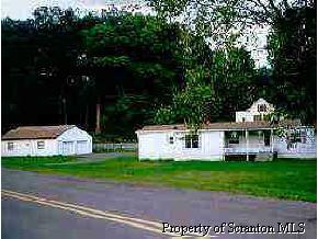 Randolph Road Great Bend, PA 18821 - Photo 1 of 1 a front view of a house with garden