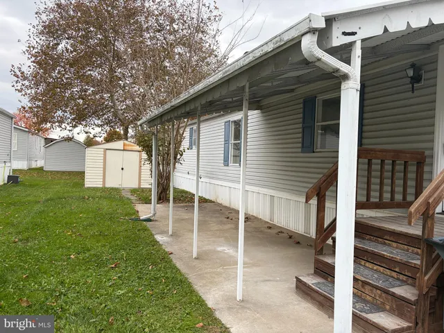 a house view with a backyard space