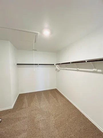 a view of a refrigerator in kitchen