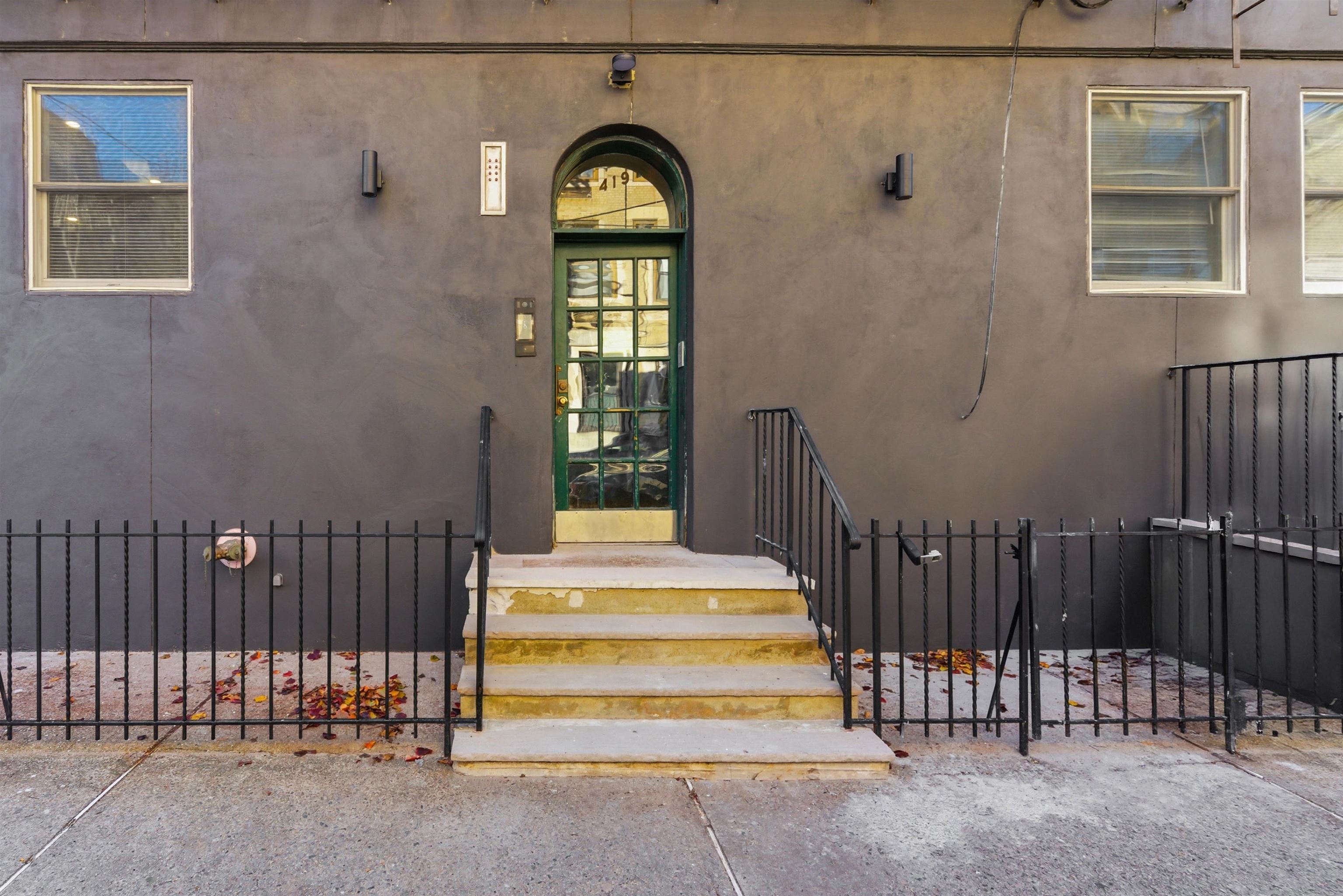 419 5th Street, Unit C Hoboken, NJ 07030 - Photo 14 of 16 a view of entryway with wooden floor and a window
