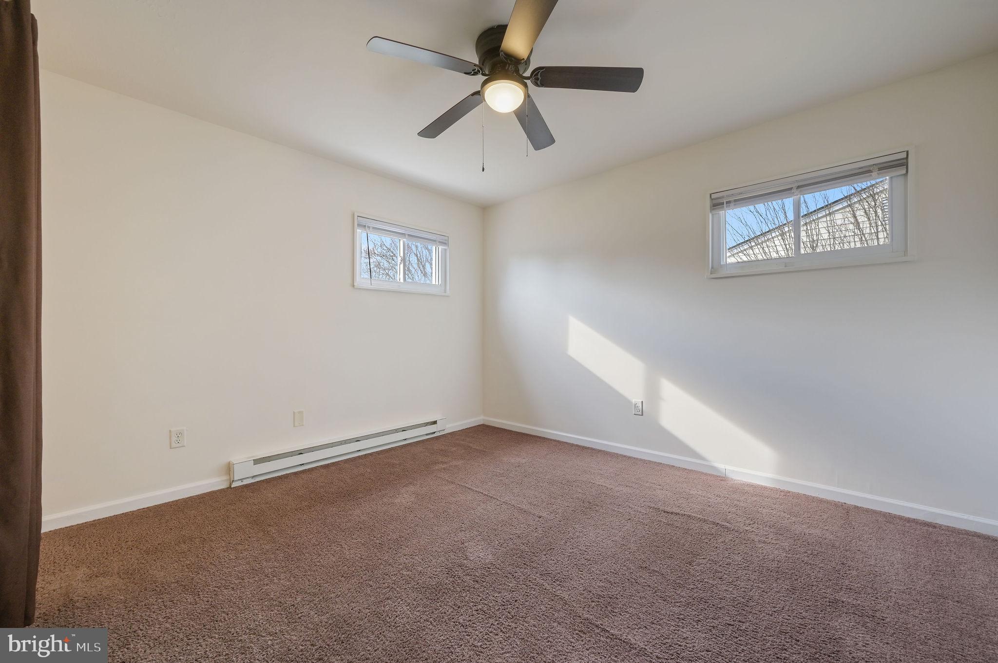1431 Joshua Clayton Road Dover, DE 19904 - Photo 15 of 31 wooden floor in an empty room