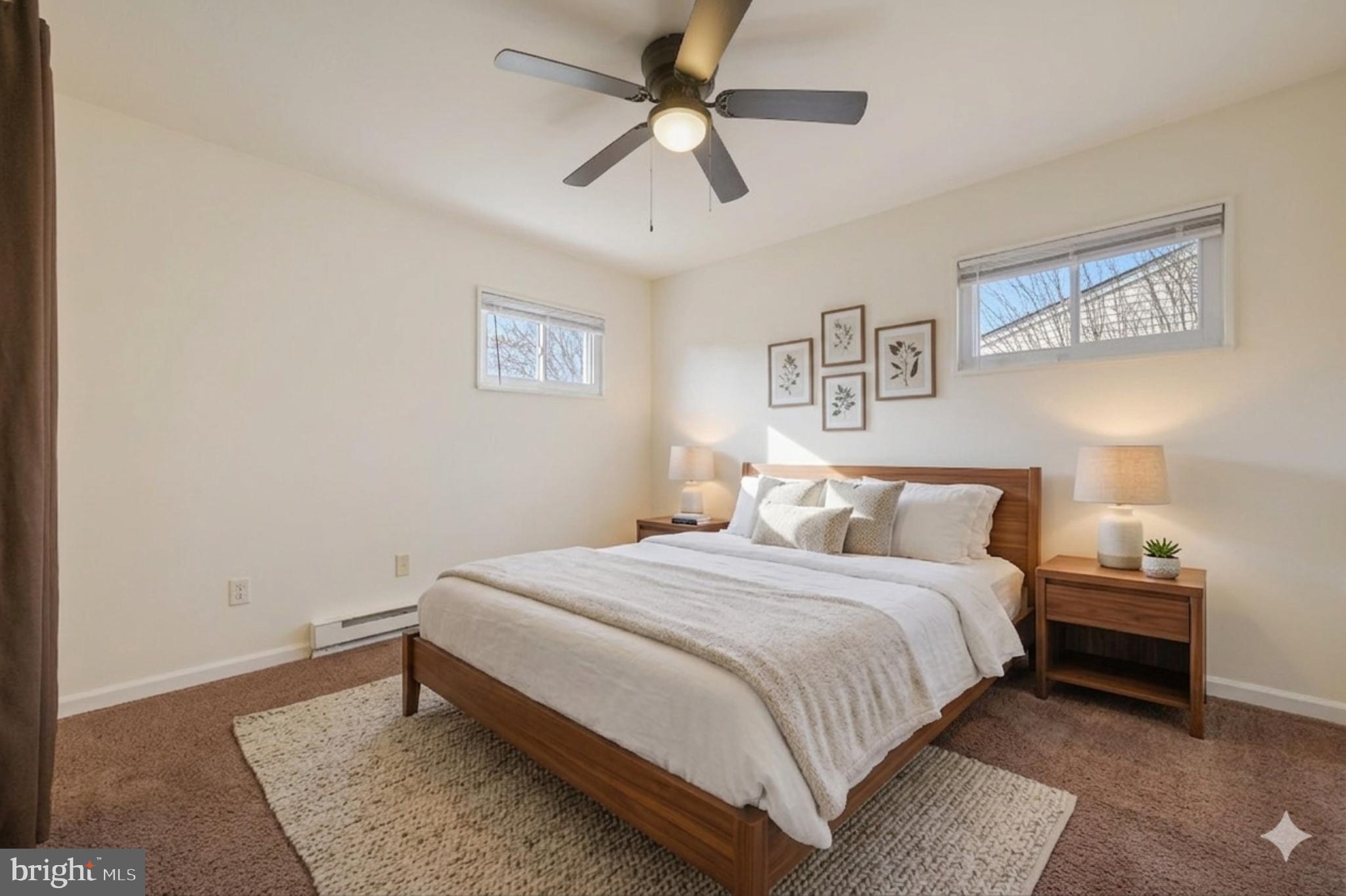 1431 Joshua Clayton Road Dover, DE 19904 - Photo 16 of 31 a bedroom with a bed and a ceiling fan