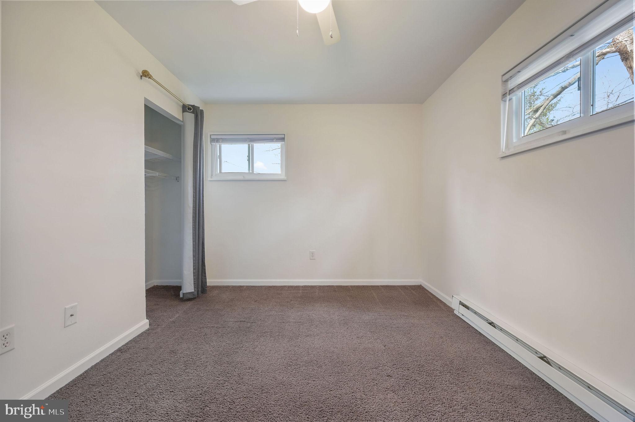 1431 Joshua Clayton Road Dover, DE 19904 - Photo 24 of 31 a view of an empty room with a window