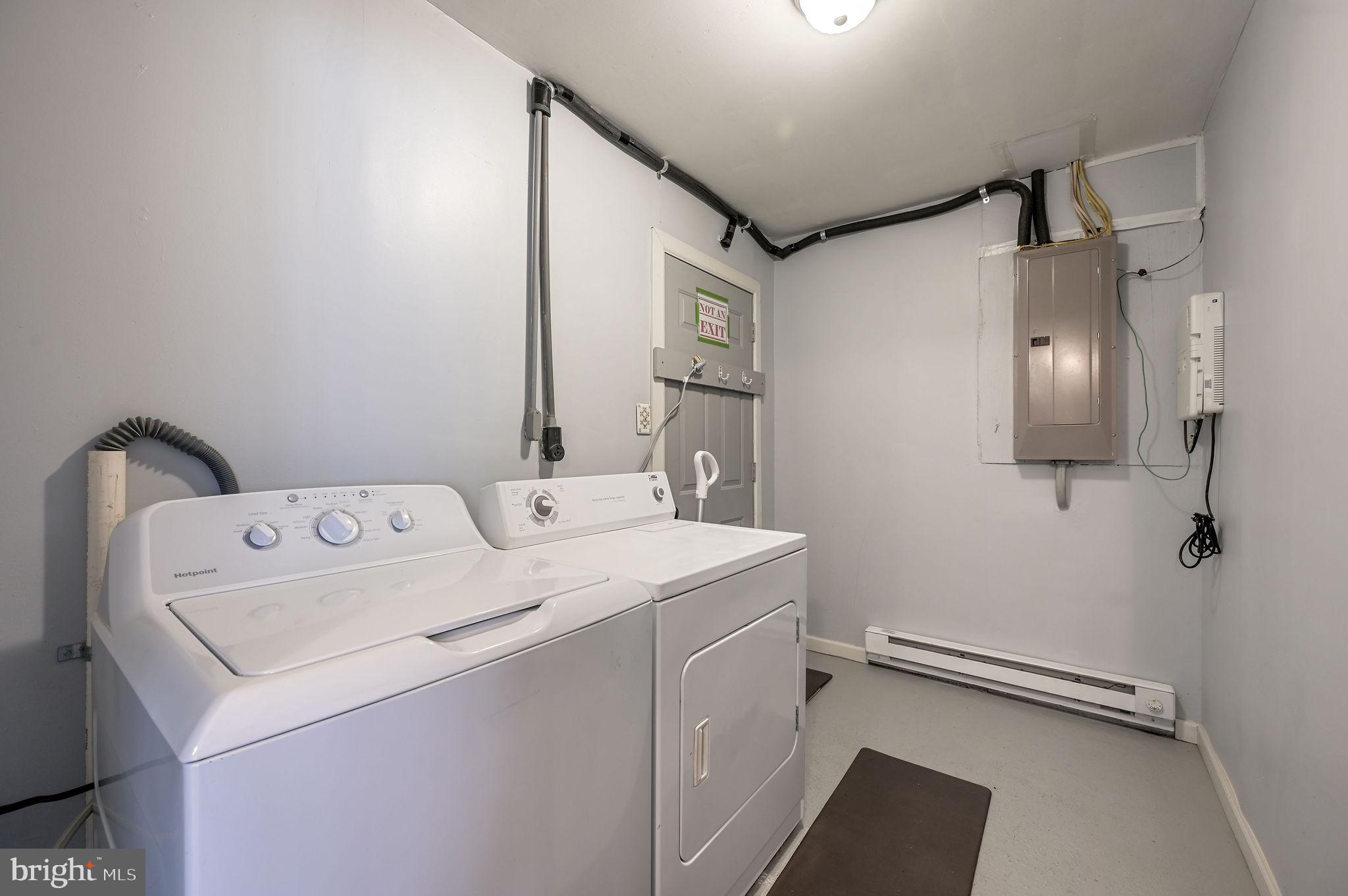 1431 Joshua Clayton Road Dover, DE 19904 - Photo 27 of 31 a utility room with dryer and washer