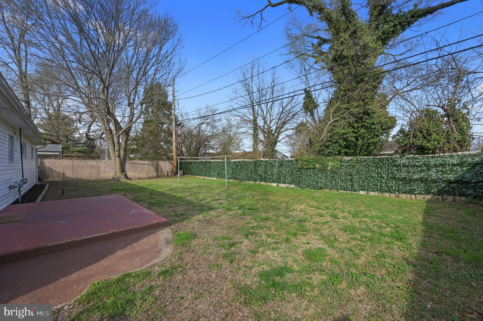1431 Joshua Clayton Road Dover, DE 19904 - Photo 29 of 31 a view of a park with large trees
