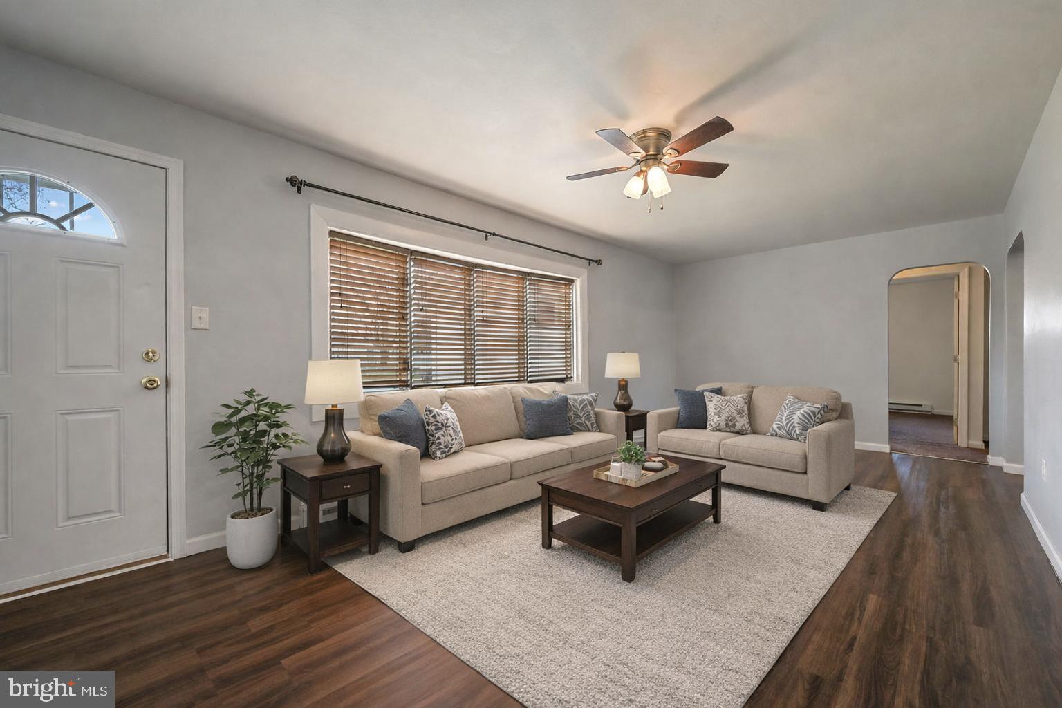 1431 Joshua Clayton Road Dover, DE 19904 - Photo 3 of 31 a living room with furniture and a large window