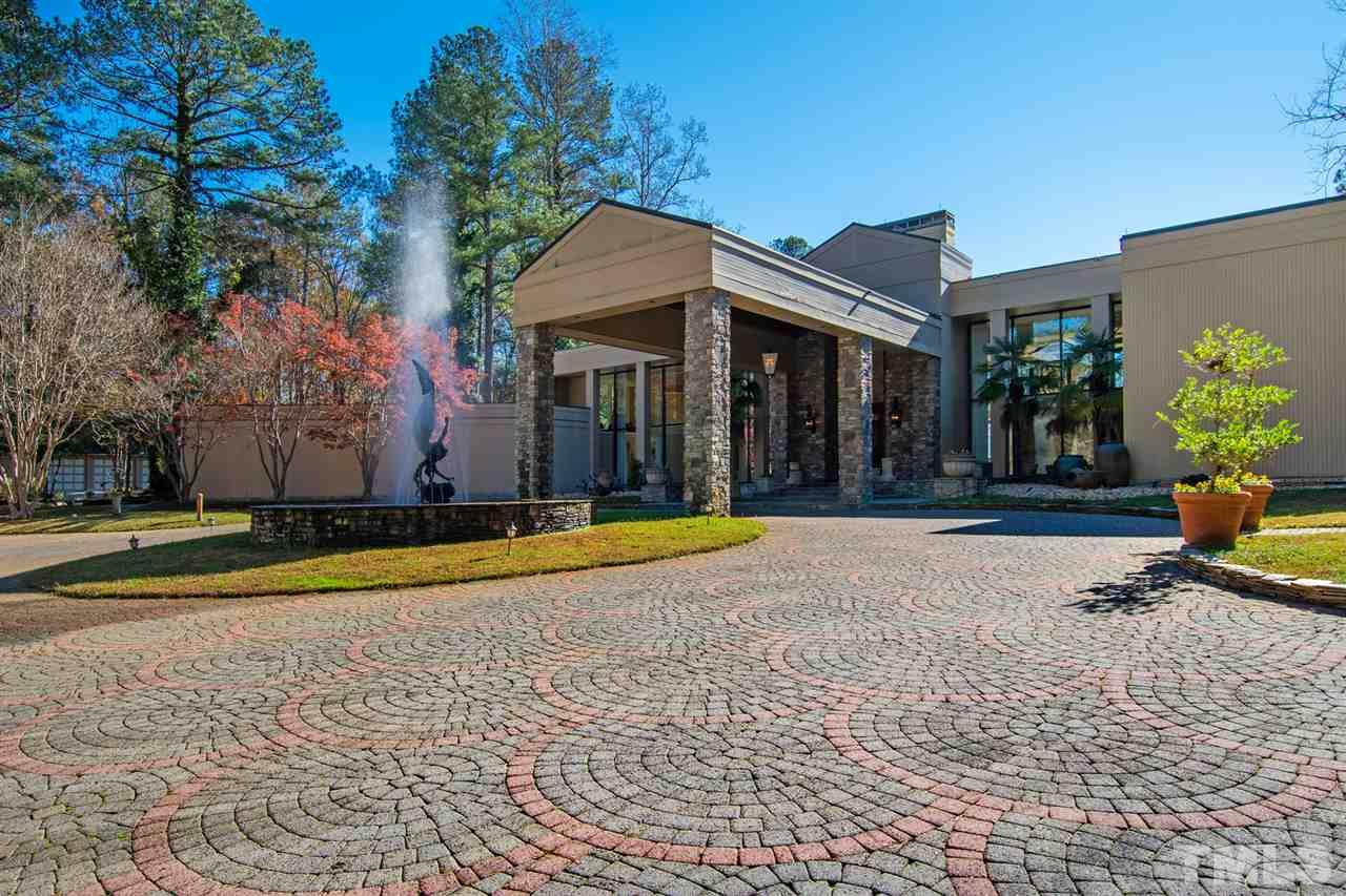 126 Hagwood Road Zebulon, NC 27597 - Photo 2 of 30 a view of a house with swimming pool and sitting area
