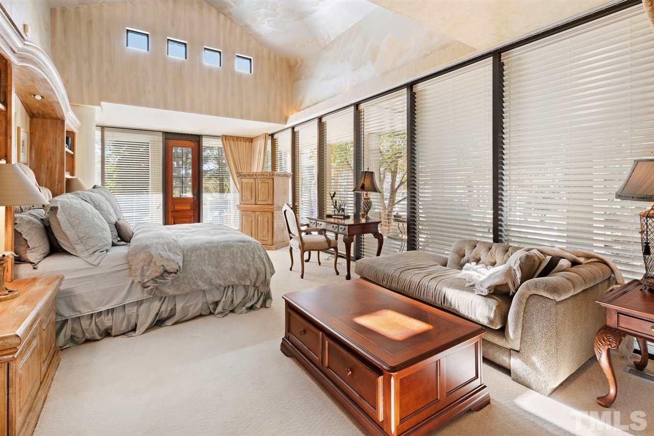 126 Hagwood Road Zebulon, NC 27597 - Photo 15 of 30 a living room with furniture and a floor to ceiling window