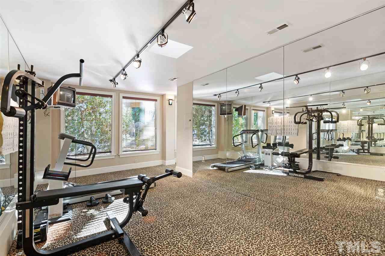 126 Hagwood Road Zebulon, NC 27597 - Photo 18 of 30 a view of a room with gym equipment