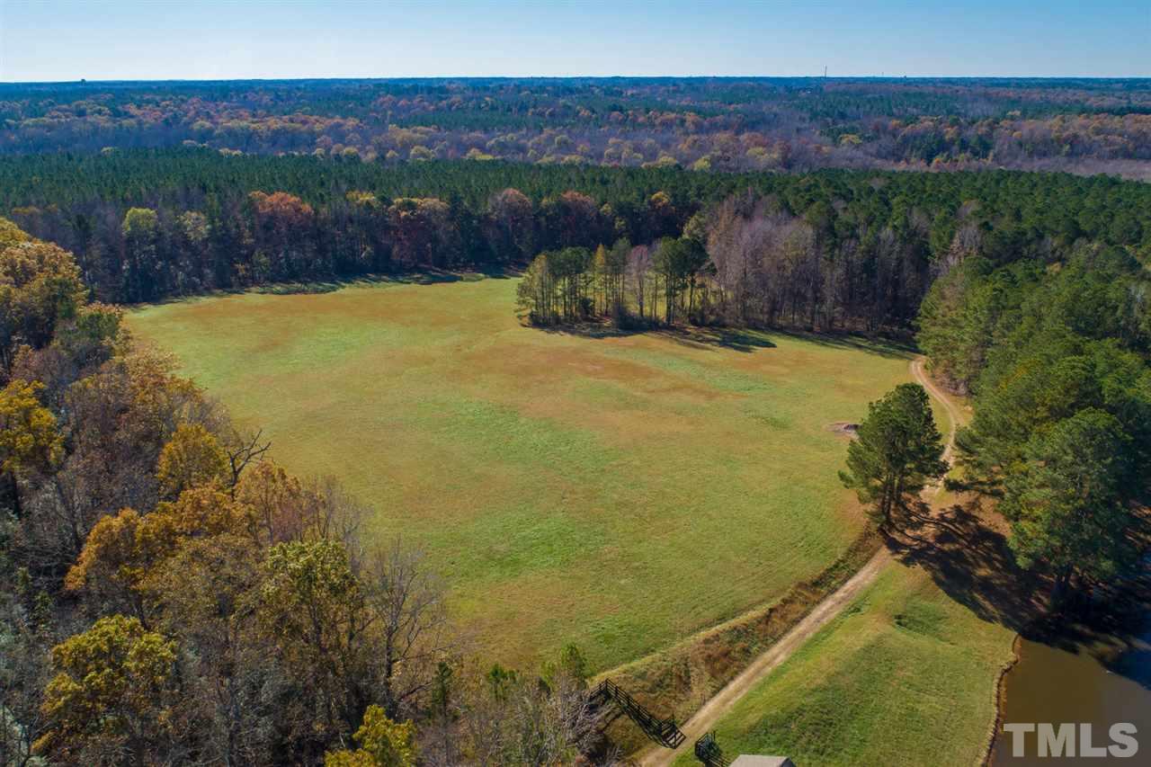 126 Hagwood Road Zebulon, NC 27597 - Photo 24 of 30 a view of a lake in middle of the town