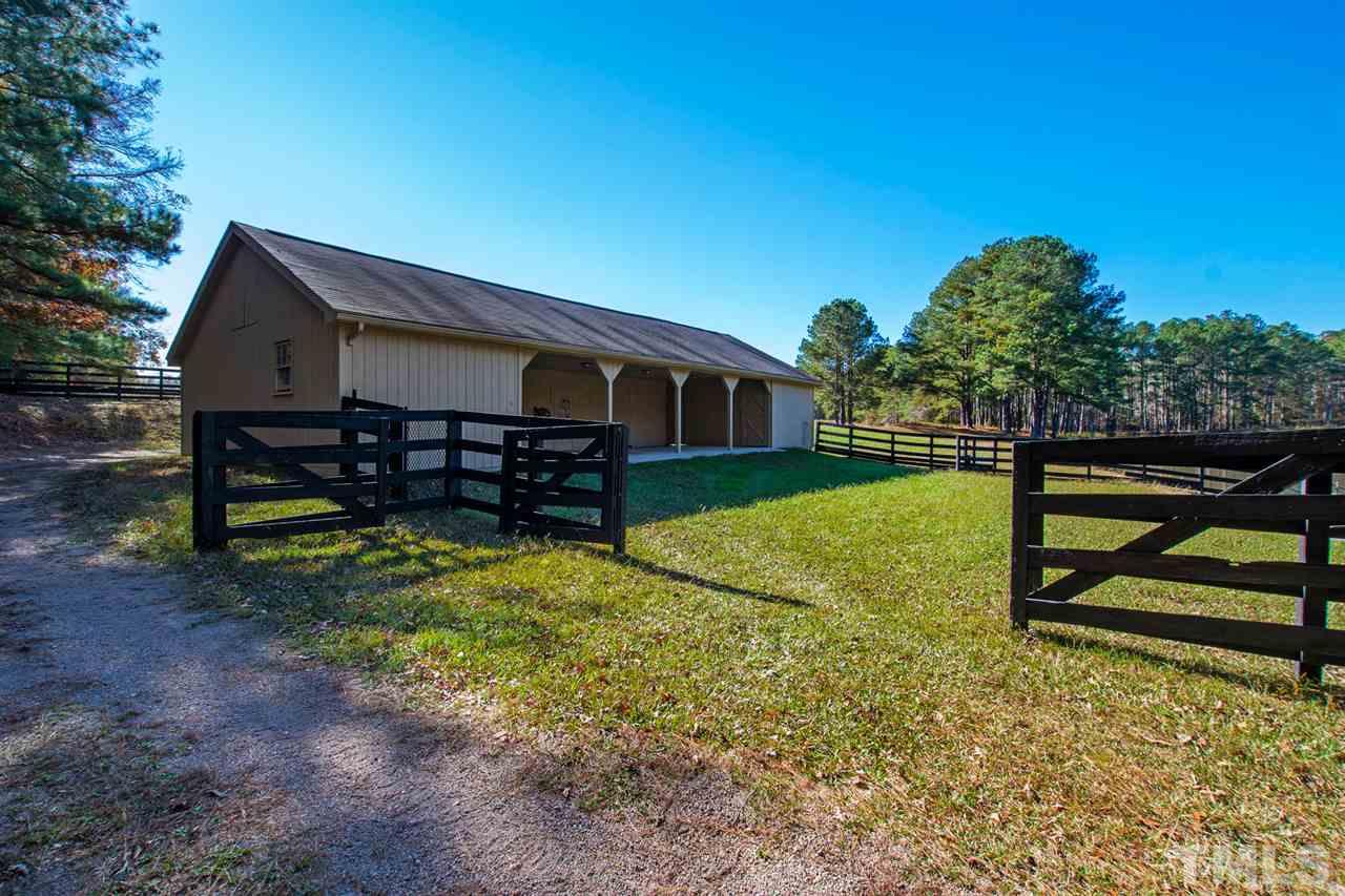 126 Hagwood Road Zebulon, NC 27597 - Photo 27 of 30 a view of a house with wooden fence