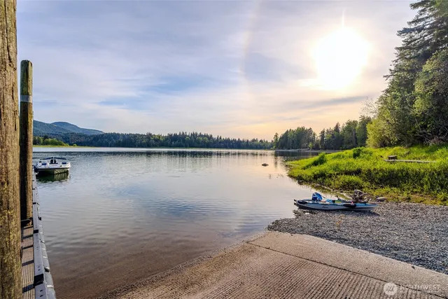 a view of a lake with a big yard