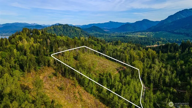 a view of mountain with a lake