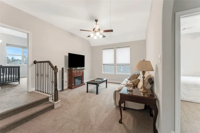 a bedroom with bed and a potted plant