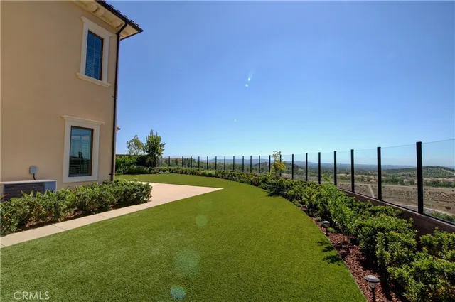 a view of a garden with wooden bridge