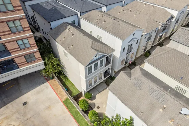 a view of a house with a small yard