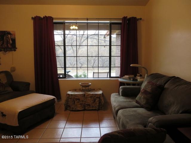 963 Calle Amarillo Rio Rico, AZ 85648 - Photo 13 of 31 a living room with furniture and a window