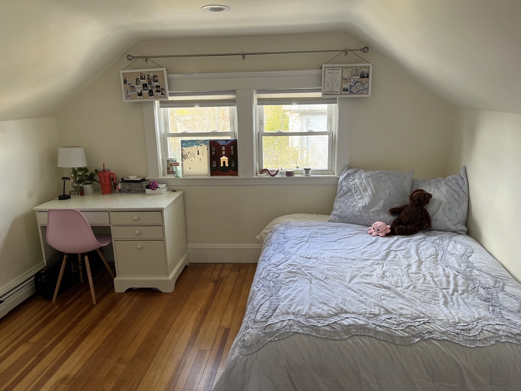 3 Chester Road, Unit 3 Belmont, MA 02478 - Photo 33 of 40 a bedroom with a bed and a window