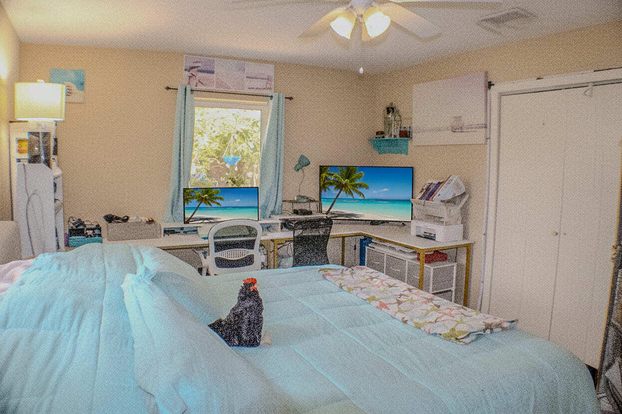 711 Sharon Place Key Largo, FL 33037 - Photo 15 of 38 a living room with stainless steel appliances furniture a large window and a wooden floor