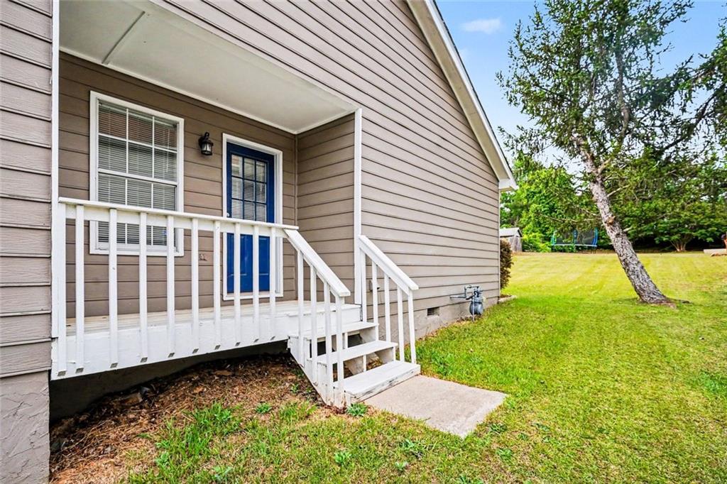 6221 Amberly Road Rex, GA 30273 - Photo 15 of 17 a view of a house with backyard and sitting area