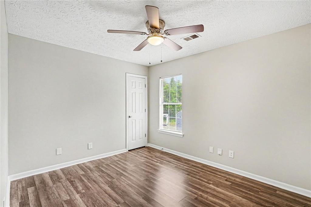 6221 Amberly Road Rex, GA 30273 - Photo 9 of 17 a view of an empty room with a window